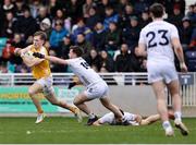 23 March 2025; Ryan McQuillan of Antrim in action against Niall Kelly of Kildare during the Allianz Football League Division 3 match between Kildare and Antrim at Cedral St. Conleth's Park in Newbridge, Kildare. Photo by Thomas Flinkow/Sportsfile