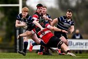 23 March 2025; Shane McGuinness of Wexford Wanderers is tackled by Liam Gaffney of Wicklow during the Bank of Ireland Provincial Towns Cup Round 3 match between Wicklow RFC and Wexford Wanderers RFC at Ashtown Lane in Wicklow. Photo by Seb Daly/Sportsfile