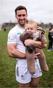 23 March 2025; Ben McCormack of Kildare with his son Navy after the Allianz Football League Division 3 match between Kildare and Antrim at Cedral St. Conleth's Park in Newbridge, Kildare. Photo by Thomas Flinkow/Sportsfile