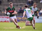 23 March 2025; Matthew Ruane in action against Luke McGlynn, 15, and Ciarán Thompson of Donegal during the Allianz Football League Division 1 match between Mayo and Donegal at Hastings Insurance MacHale Park in Castlebar, Mayo. Photo by Piaras Ó Mídheach/Sportsfile