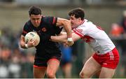 23 March 2025; Stefan Campbell of Armagh in action against Padraig McGrogan of Derry during the Allianz Football League Division 1 match between Armagh and Derry at BOX-IT Athletic Grounds in Armagh. Photo by Ramsey Cardy/Sportsfile