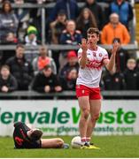 23 March 2025; Shane McGuigan of Derry reacts to a collision with Greg McCabe of Armagh during the Allianz Football League Division 1 match between Armagh and Derry at BOX-IT Athletic Grounds in Armagh. Photo by Ramsey Cardy/Sportsfile