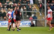 23 March 2025; Shane McGuigan of Derry is shown a red card by referee David Gough during the Allianz Football League Division 1 match between Armagh and Derry at BOX-IT Athletic Grounds in Armagh. Photo by Ramsey Cardy/Sportsfile
