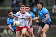 23 March 2025; Peter Harte of Tyrone in action against Ross McGarry of Dublin and Killian McGinnis of Dublin during the Allianz Football League Division 1 match between Tyrone and Dublin at O'Neills Healy Park in Omagh, Tyrone. Photo by Ray McManus/Sportsfile