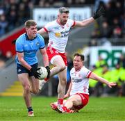 23 March 2025; Greg McEneaney of Dublin in action against Mattie Donnelly and Kieran McGeary of Tyrone, right, during the Allianz Football League Division 1 match between Tyrone and Dublin at O'Neills Healy Park in Omagh, Tyrone. Photo by Ray McManus/Sportsfile