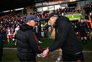 23 March 2025; Derry manager Paddy Tally, left, shakes hands with Armagh manager Kieran McGeeney after the Allianz Football League Division 1 match between Armagh and Derry at BOX-IT Athletic Grounds in Armagh. Photo by Ramsey Cardy/Sportsfile