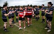 23 March 2025; Wicklow captain Shane Farrar, left, leads his side from the pitch after their side's victory in the Bank of Ireland Provincial Towns Cup Round 3 match between Wicklow RFC and Wexford Wanderers RFC at Ashtown Lane in Wicklow. Photo by Seb Daly/Sportsfile