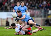 23 March 2025; Ross McGarry of Dublin in action against Peter Teague of Tyrone during the Allianz Football League Division 1 match between Tyrone and Dublin at O'Neills Healy Park in Omagh, Tyrone. Photo by Ray McManus/Sportsfile