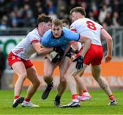 23 March 2025; Peadar Ó Cofaigh Byrne of Dublin in action against Aodhan Donaghy, left, and Brian Kennedy of Tyrone during the Allianz Football League Division 1 match between Tyrone and Dublin at O'Neills Healy Park in Omagh, Tyrone. Photo by Ray McManus/Sportsfile