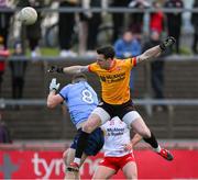 23 March 2025; Tyrone goalkeeper Niall Morgan in action against Brian Howard of Dublin during the Allianz Football League Division 1 match between Tyrone and Dublin at O'Neills Healy Park in Omagh, Tyrone. Photo by Ray McManus/Sportsfile