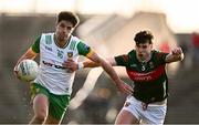 23 March 2025; Dáire Ó Baoill of Donegal in action against Sam Callinan of Mayo during the Allianz Football League Division 1 match between Mayo and Donegal at Hastings Insurance MacHale Park in Castlebar, Mayo. Photo by Piaras Ó Mídheach/Sportsfile
