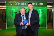 23 March 2025; Former Republic of Ireland international Niall Quinn, right, is presented with a Hall of Fame award by FAI President Paul Cooke before the UEFA Nations League B/C Play-off 2nd Leg match between Republic of Ireland and Bulgaria at the Aviva Stadium in Dublin. Photo by Stephen McCarthy/Sportsfile