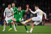 23 March 2025; Marin Petkov of Bulgaria in action against Josh Cullen of Republic of Ireland during the UEFA Nations League B/C Play-off 2nd Leg match between Republic of Ireland and Bulgaria at the Aviva Stadium in Dublin. Photo by Stephen McCarthy/Sportsfile
