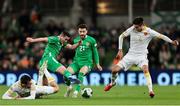 23 March 2025; Josh Cullen of Republic of Ireland in action against Bulgaria players Marin Petkov, left, and Ilia Gruev during the UEFA Nations League B/C Play-off 2nd Leg match between Republic of Ireland and Bulgaria at the Aviva Stadium in Dublin. Photo by Thomas Flinkow/Sportsfile