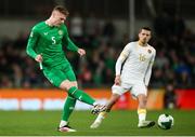 23 March 2025; Jake O'Brien of Republic of Ireland in action against Marin Petkov of Bulgaria during the UEFA Nations League B/C Play-off 2nd Leg match between Republic of Ireland and Bulgaria at the Aviva Stadium in Dublin. Photo by Michael P Ryan/Sportsfile