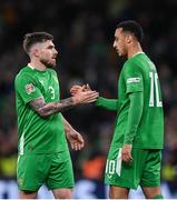 23 March 2025; Ryan Manning of Republic of Ireland, left, and team-mate Adam Idah after the UEFA Nations League B/C Play-off 2nd Leg match between Republic of Ireland and Bulgaria at the Aviva Stadium in Dublin. Photo by Stephen McCarthy/Sportsfile