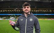 23 March 2025; Troy Parrott of Republic of Ireland with his player of the match award after the UEFA Nations League B/C Play-off 2nd Leg match between Republic of Ireland and Bulgaria at the Aviva Stadium in Dublin. Photo by Stephen McCarthy/Sportsfile
