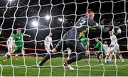 23 March 2025; Bulgaria goalkeeper Plamen Iliev saves a shot from Jake O'Brien of Republic of Ireland during the UEFA Nations League B/C Play-off 2nd Leg match between Republic of Ireland and Bulgaria at the Aviva Stadium in Dublin. Photo by Stephen McCarthy/Sportsfile