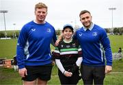 23 March 2025; Leinster players Paddy McCarthy and Jordan Larmour with participants during the De La Salle Palmerston U12s Rugby Blitz 2025 at Kirwan Park in Kiltiernan, Dublin. Photo by Seb Daly/Sportsfile