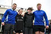 23 March 2025; Leinster players Paddy McCarthy and Jordan Larmour with participants during the De La Salle Palmerston U12s Rugby Blitz 2025 at Kirwan Park in Kiltiernan, Dublin. Photo by Seb Daly/Sportsfile