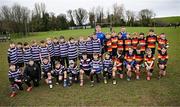 23 March 2025; Leinster players Paddy McCarthy and Jordan Larmour with participants during the De La Salle Palmerston U12s Rugby Blitz 2025 at Kirwan Park in Kiltiernan, Dublin. Photo by Seb Daly/Sportsfile