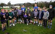 23 March 2025; Leinster players Paddy McCarthy and Jordan Larmour with participants during the De La Salle Palmerston U12s Rugby Blitz 2025 at Kirwan Park in Kiltiernan, Dublin. Photo by Seb Daly/Sportsfile