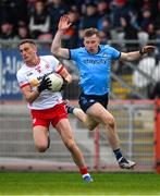 23 March 2025; Conn Kilpatrick of Tyrone in action against Seán Bugler of Dublin during the Allianz Football League Division 1 match between Tyrone and Dublin at O'Neills Healy Park in Omagh, Tyrone. Photo by Ray McManus/Sportsfile