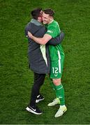23 March 2025; Jimmy Dunne of Republic of Ireland with FAI communications manager Kieran Crowley after the UEFA Nations League B/C Play-off 2nd Leg match between Republic of Ireland and Bulgaria at the Aviva Stadium in Dublin. Photo by Sam Barnes/Sportsfile