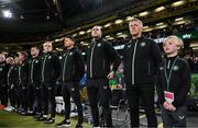 23 March 2025; Special guest Freddie Munnelly stands alongside Republic of Ireland head coach Heimir Hallgrimsson and his staff during the playing of the national anthems before the UEFA Nations League B/C Play-off 2nd Leg match between Republic of Ireland and Bulgaria at the Aviva Stadium in Dublin. Photo by Stephen McCarthy/Sportsfile