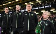 23 March 2025; Special guest Freddie Munnelly stands alongside Republic of Ireland head coach Heimir Hallgrimsson and his staff during the playing of the national anthems before the UEFA Nations League B/C Play-off 2nd Leg match between Republic of Ireland and Bulgaria at the Aviva Stadium in Dublin. Photo by Stephen McCarthy/Sportsfile