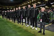 23 March 2025; Special guest Freddie Munnelly stands alongside Republic of Ireland head coach Heimir Hallgrimsson and his staff during the playing of the national anthems before the UEFA Nations League B/C Play-off 2nd Leg match between Republic of Ireland and Bulgaria at the Aviva Stadium in Dublin. Photo by Stephen McCarthy/Sportsfile