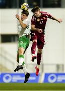 24 March 2025; Conor McManus of Republic of Ireland in action against Dominik Csoka of Hungary during the U21 International Friendly match between Republic of Ireland and Hungary at Pinatar Arena in Murcia, Spain. Photo by Manu Reino/Sportsfile