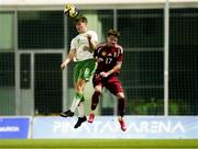 24 March 2025; Conor McManus of Republic of Ireland in action against Dominik Csoka of Hungary during the U21 International Friendly match between Republic of Ireland and Hungary at Pinatar Arena in Murcia, Spain. Photo by Manu Reino/Sportsfile
