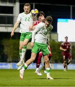 24 March 2025; Republic of Ireland players Darius Lipsiuc, left, and Mason Melia in action against Kevin Banati of Hungary during the U21 International Friendly match between Republic of Ireland and Hungary at Pinatar Arena in Murcia, Spain. Photo by Manu Reino/Sportsfile