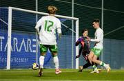 24 March 2025; Mason Melia of Republic of Ireland is fouled by Hungary goalkeeper Balazs Toth for a penalty, that Melia scored from, during the U21 International Friendly match between Republic of Ireland and Hungary at Pinatar Arena in Murcia, Spain. Photo by Manu Reino/Sportsfile