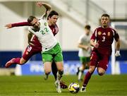 24 March 2025; Darius Lipsiuc of Republic of Ireland in action against Adrian Denes of Hungary during the U21 International Friendly match between Republic of Ireland and Hungary at Pinatar Arena in Murcia, Spain. Photo by Manu Reino/Sportsfile