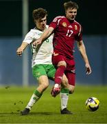 24 March 2025; Dominik Csoka of Hungary in action against Conor McManus of Republic of Ireland during the U21 International Friendly match between Republic of Ireland and Hungary at Pinatar Arena in Murcia, Spain. Photo by Manu Reino/Sportsfile