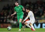 23 March 2025; Finn Azaz of Republic of Ireland in action against Ilia Gruev of Bulgaria during the UEFA Nations League B/C Play-off 2nd Leg match between Republic of Ireland and Bulgaria at the Aviva Stadium in Dublin. Photo by Michael P Ryan/Sportsfile