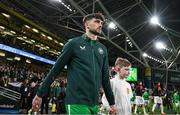 23 March 2025; Troy Parrott of Republic of Ireland and mascot Noah Clarke before the UEFA Nations League B/C Play-off 2nd Leg match between Republic of Ireland and Bulgaria at the Aviva Stadium in Dublin. Photo by Stephen McCarthy/Sportsfile
