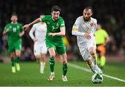 23 March 2025; Nikolay Minkov of Bulgaria in action against Finn Azaz of Republic of Ireland during the UEFA Nations League B/C Play-off 2nd Leg match between Republic of Ireland and Bulgaria at the Aviva Stadium in Dublin. Photo by Stephen McCarthy/Sportsfile