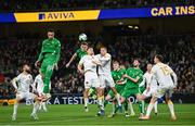 23 March 2025; Jimmy Dunne and Adam Idah, left, of Republic of Ireland in action against Ilian Iliev Jr., 22, and Valentin Antov of Bulgaria  during the UEFA Nations League B/C Play-off 2nd Leg match between Republic of Ireland and Bulgaria at the Aviva Stadium in Dublin. Photo by Stephen McCarthy/Sportsfile