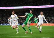23 March 2025; Finn Azaz of Republic of Ireland in action against Filip Krastev, left, and Anton Nedyalkov of Bulgaria during the UEFA Nations League B/C Play-off 2nd Leg match between Republic of Ireland and Bulgaria at the Aviva Stadium in Dublin. Photo by Stephen McCarthy/Sportsfile
