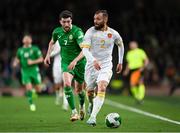 23 March 2025; Nikolay Minkov of Bulgaria in action against Finn Azaz of Republic of Ireland during the UEFA Nations League B/C Play-off 2nd Leg match between Republic of Ireland and Bulgaria at the Aviva Stadium in Dublin. Photo by Stephen McCarthy/Sportsfile