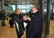 26 March 2025; Republic of Ireland head coach Colin O'Brien is greeted by FAI chief executive officer David Courell on the team's arrival at Dublin Airport following their qualification for the FIFA U-17 World Cup to be held in Qatar, in November 2025. The team reached the Finals for the first time in their history as one of four best-placed runners-up for qualification for the UEFA European Under-17 Championships. Their final standing position of second in Group A6, held in Poland, with six points, seven goals scored and just one goal conceded saw them miss out on the U17 EUROs but it was still enough to see them confirm a place at the World Cup in November. Photo by Stephen McCarthy/Sportsfile