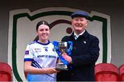 27 March 2025; Mount St Michael captain Siomha McNulty receives the cup from LGFA Vice-President Brendan Cregg after her side's victory in the Lidl LGFA PPS All-Ireland Senior B final match between Eureka Secondary School of Kells in Meath and Mount St Michael of Claremorris in Mayo at St Brigid's GAA in Roscommon. Photo by Piaras Ó Mídheach/Sportsfile