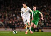 23 March 2025; Simeon Petrov of Bulgaria and Evan Ferguson of Republic of Ireland during the UEFA Nations League B/C Play-off 2nd Leg match between Republic of Ireland and Bulgaria at the Aviva Stadium in Dublin. Photo by Ben McShane/Sportsfile