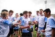 28 March 2025; DLR captain Louis Grehan, centre, and team-mates celebrate after their victory in the match between DLR and FCC during the Leinster Rugby 2025 Metropolitan County Council Cup Finals at Energia Park in Dublin. Photo by Shauna Clinton/Sportsfile