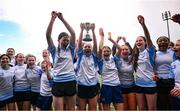 28 March 2025; DLR captain Lucy Scanlon, centre, celebrates with team-mates after their side's victory in the match between DCC and DLR during the Leinster Rugby 2025 Metropolitan County Council Cup Finals at Energia Park in Dublin. Photo by Shauna Clinton/Sportsfile