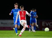28 March 2025; Chris Forrester of St Patrick's Athletic in action against Conan Noonan of Waterford during the SSE Airtricity Men's Premier Division match between Waterford and St Patrick's Athletic at the Regional Sports Centre in Waterford. Photo by Michael P Ryan/Sportsfile