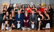 28 March 2025; The AIG Ladies HEC Rising Stars 2025 team of the year, back row, from left to right; Riane McGrath of DCU Dóchas Éireann 4; Niamh McCorry of DCU Dóchas Éireann 4; Emily Hevey of DCU Dóchas Éireann 4 ; Caoimhe Boyle of DCU Dóchas Éireann 4 ; Áine Smith of DCU Dóchas Éireann 4 ; Sarah Boyd of DCU Dóchas Éireann 7; Aisling Costelloe of Atlantic Technological University Galway; Claire O’Donohoe of University of Limerick 5; and Ciara Dowd of University of Limerick 5; Front row, from left to right, Brigid O’Reilly of Technological University Dublin CC; Shannon Russell of Technological University Dublin CC; Daniel Caldwell, Chairperson Ladies HEC; Ladies Gaelic Football Association President Trina Murray; John Gillick, Head of Consumer Marketing and Sponsorship, AIG Ireland; Rachel McIntyre of Marino Institute of Education and Kelli McGrath of Atlantic Technological University Galway;  during the 2025 AIG Ladies HEC All-Stars and Rising Stars evening, at the Dublin Bonnington Hotel. Photo by Ramsey Cardy/Sportsfile